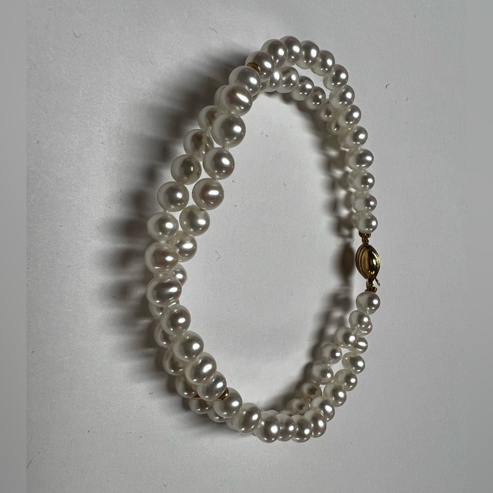 Beautiful double strand 14k yellow gold pearl bracelet